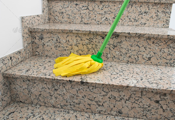 yellow mop cleaning