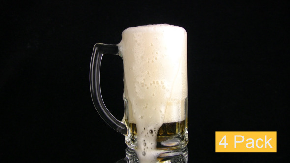 Beer Is Poured In A Mug 4-Pack Beer Is Poured In A Mug 4-Pack