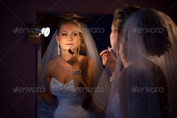 Pretty Bride by the Mirror