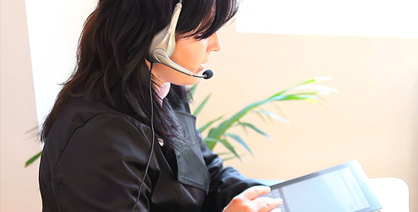 Receptionist on the Phone with Tablet Computer 1 Receptionist on the Phone with Tablet Computer 1