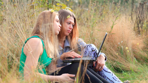 Female Friends With Laptop Outdoor Female Friends With Laptop Outdoor