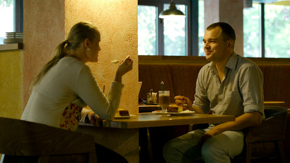 Young Couple in A Cafe Young Couple in A Cafe