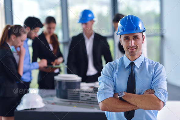 business people and construction engineers on meeting - Stock Photo - Images