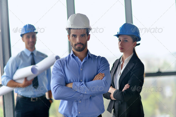 business people and construction engineers on meeting - Stock Photo - Images