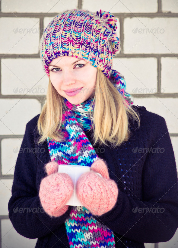 Smiling Woman with coffee cup Winter time