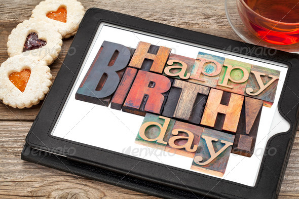 Happy birthday on digital tablet