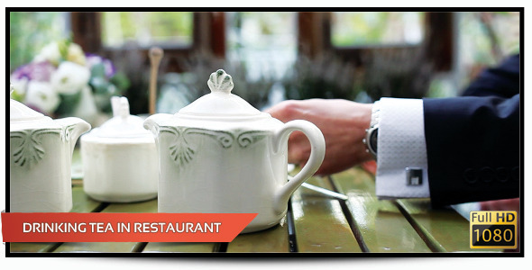 Drinking Tea in Restaurant Drinking Tea in Restaurant