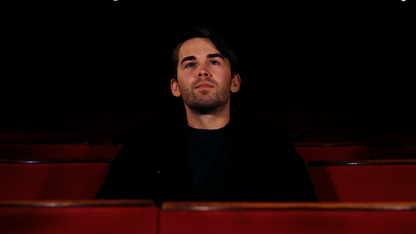 Man Sits Down At Movies Man Sits Down At Movies