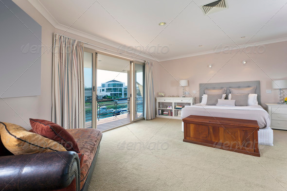stylish master bedroom in australian mansion