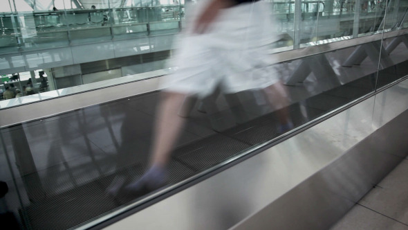 Motion in Travelator Motion in Travelator