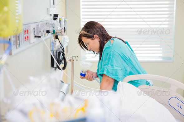 Pregnant Woman Holding Nitrous Oxide Mask In Hospital Room (Misc) Photo Download