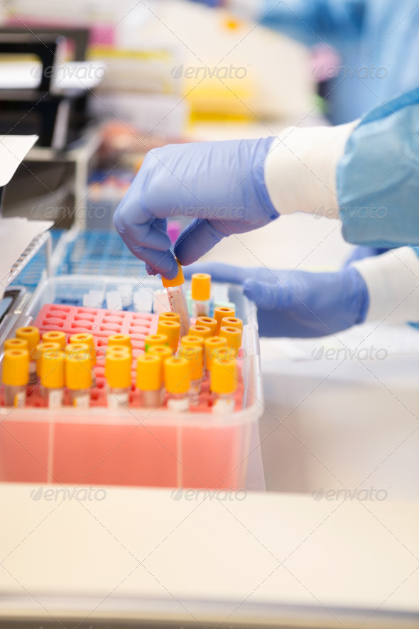 Researcher With Testtubes Working In Laboratory (Misc) Photo Download