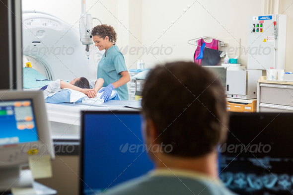 Nurse Preparing Patient For CT Scan (Misc) Photo Download