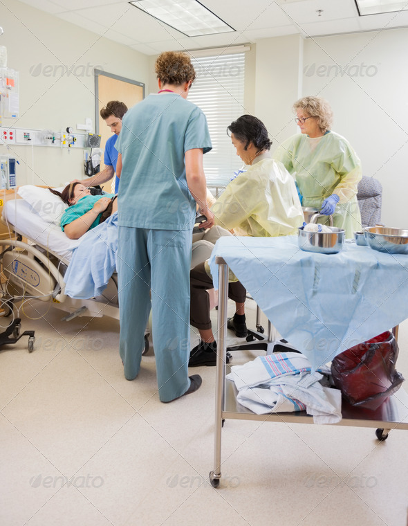 Medical Team Delivering Baby in Hospital (Misc) Photo Download