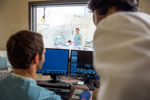 Medical Team In CT Scan Lab (Misc) Photo Download