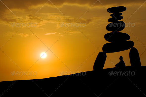 Face huge stress, meditation under sunset
