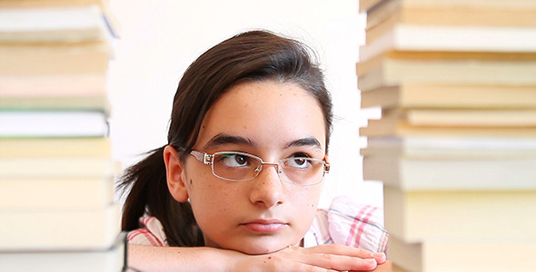 Girl Overwhelmed with School Work Girl Overwhelmed with School Work
