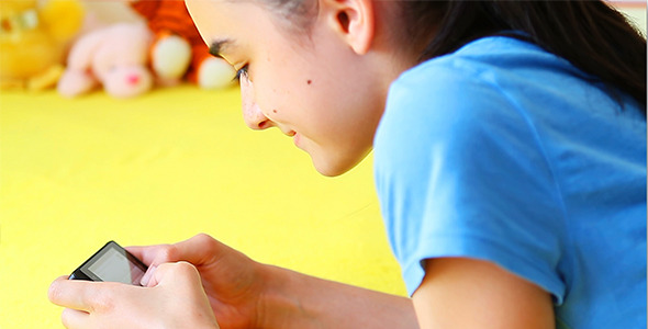 Teenage Girl Messaging on Smart Phone 2 Teenage Girl Messaging on Smart Phone 2