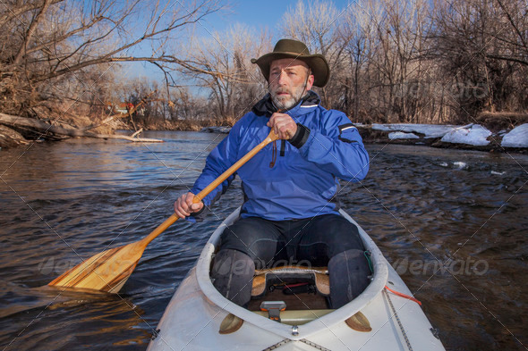 senior canoe paddler