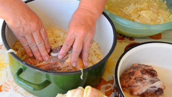 Woman s Hands Preparing Stuffed Cabbage 01 Woman s Hands Preparing Stuffed Cabbage 01