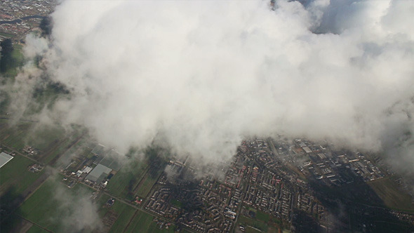Airplane Flying over City and Clouds 03 Airplane Flying over City and Clouds 03