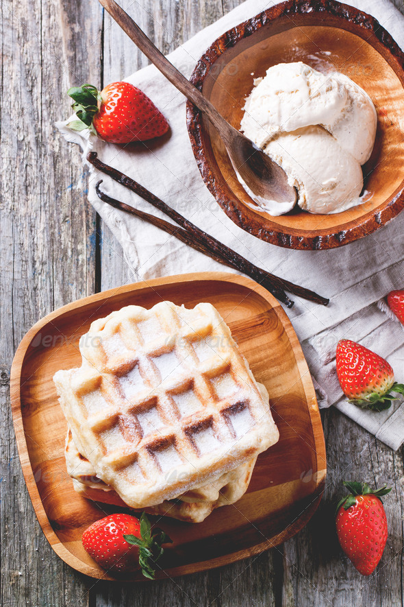 Waffles with strawberries and ice cream