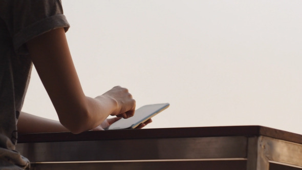 Woman Using Touch Screen Smartphone Woman Using Touch Screen Smartphone