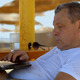 Man Working With Notebook In The Park - 138