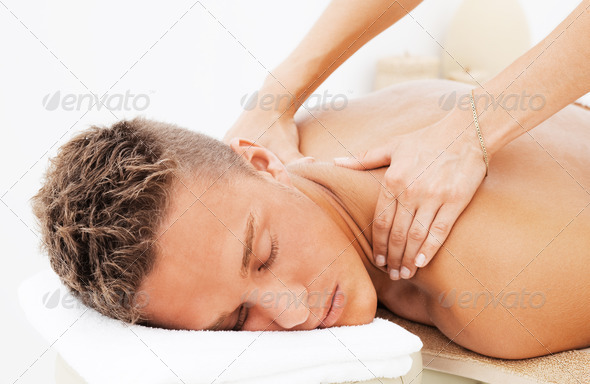 Young man getting spa treatment