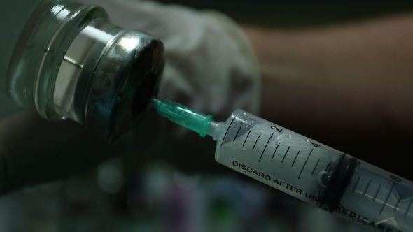 Injection Syringe Into the Jar Injection Syringe Into the Jar