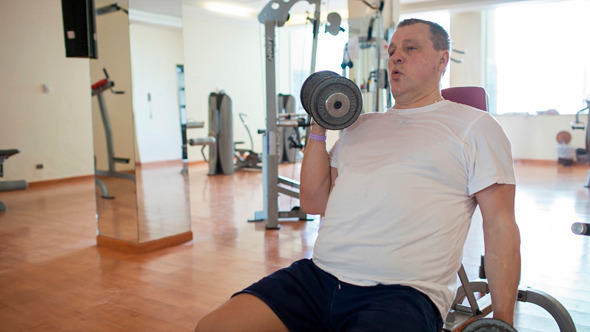 Working Out With Dumb-Bells Working Out With Dumb-Bells
