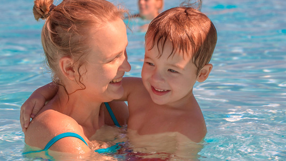 Family Fun in Swimming Pool Family Fun in Swimming Pool