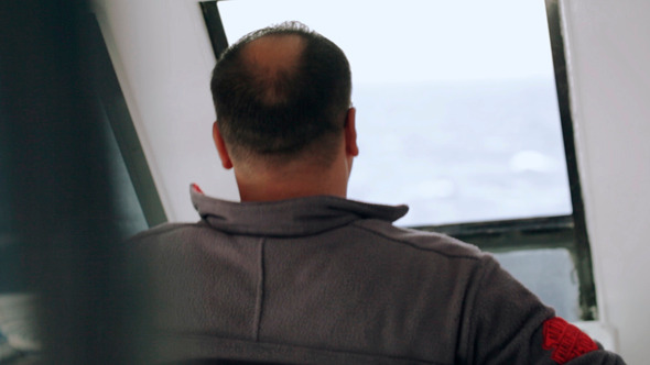 Man Driving A Yacht Man Driving A Yacht