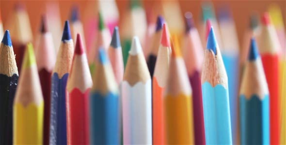 Rotating Pencil On Brown Background Rotating Pencil On Brown Background
