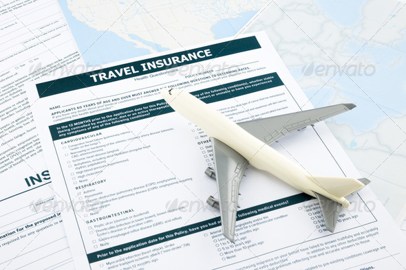 travel insurance form and plane model