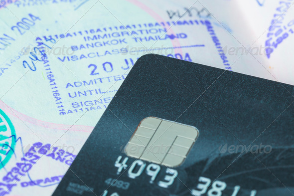 credit cards with sim and passport stamp for travel concept back