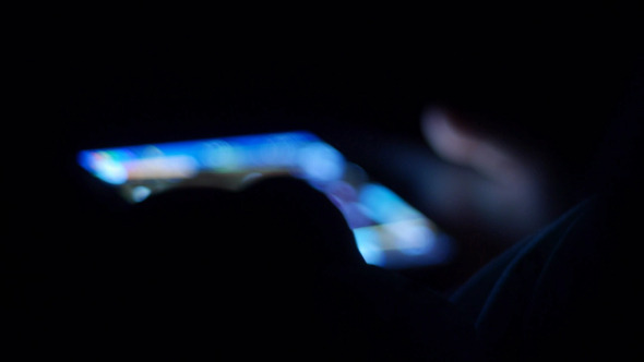 A Child Secretly Playing Game Before Sleeping A Child Secretly Playing Game Before Sleeping
