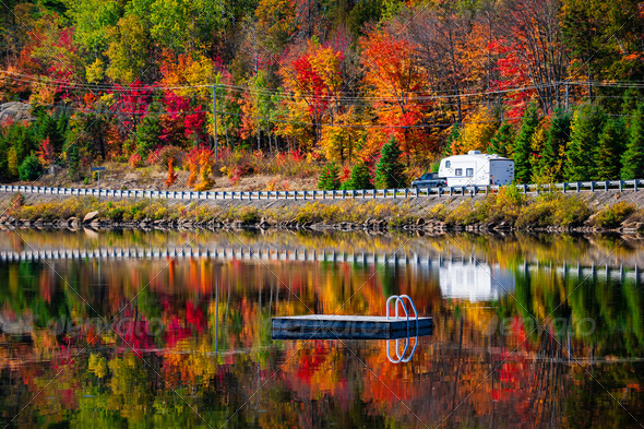 Highway through fall forest - Stock Photo - Images