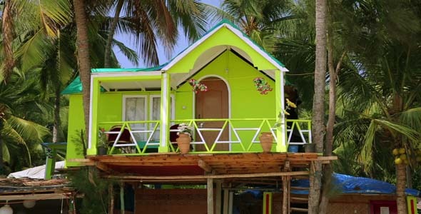 Colourful Bungalows In Resort On Sandy Beach Colourful Bungalows In Resort On Sandy Beach