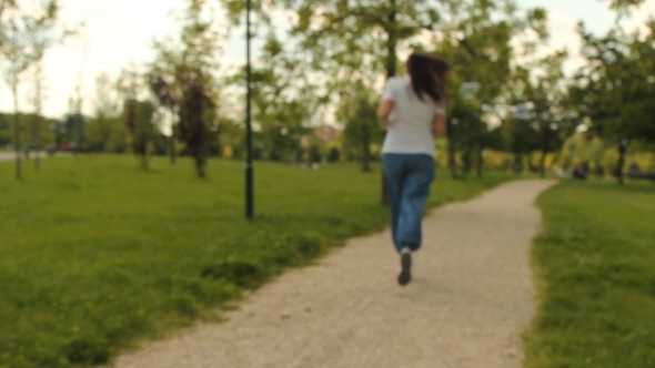 Blurry Girl Running In Park Blurry Girl Running In Park