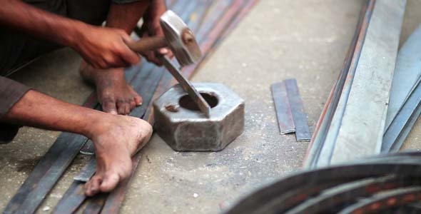 Local Craftsman Working On Piece Of Metal India Local Craftsman Working On Piece Of Metal India