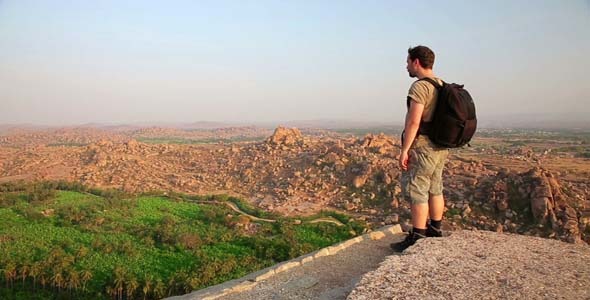 Man Admiring The Magnificent Mountain Landscape Man Admiring The Magnificent Mountain Landscape