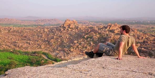 Man Admiring The Magnificent Mountain Landscape Man Admiring The Magnificent Mountain Landscape