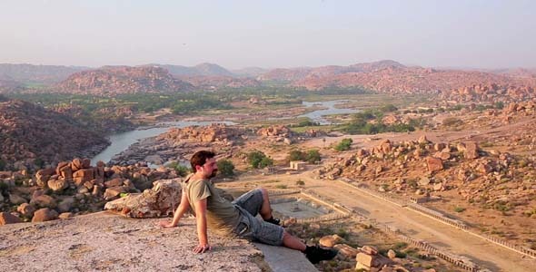 Man Admiring The Magnificent Mountain Landscape Man Admiring The Magnificent Mountain Landscape