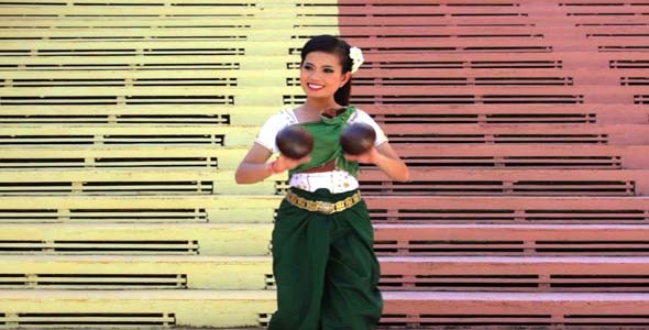 Beautiful Asian Girl Performs Coconut Folk Dance Beautiful Asian Girl Performs Coconut Folk Dance