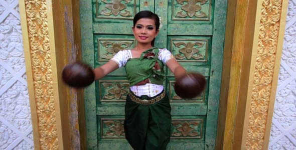 Beautiful Asian Girl Performs Coconut Folk Dance Beautiful Asian Girl Performs Coconut Folk Dance