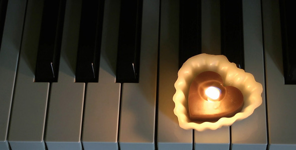 Heart Shape Candle on the Piano Heart Shape Candle on the Piano