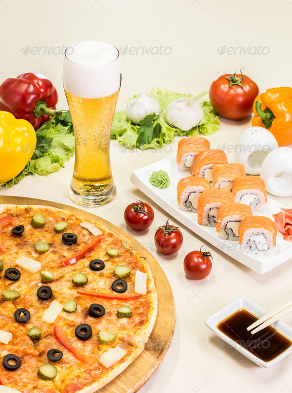composition of beer sushi and pizza
