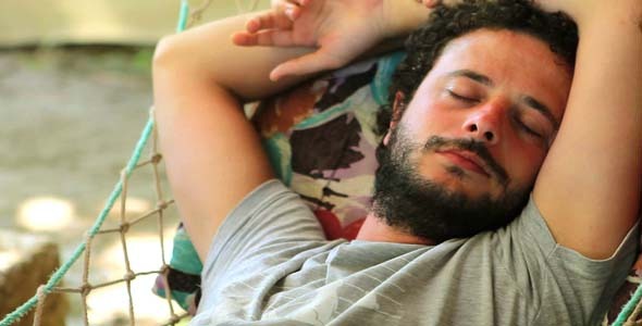 Man Sleeping On Hammock Man Sleeping On Hammock