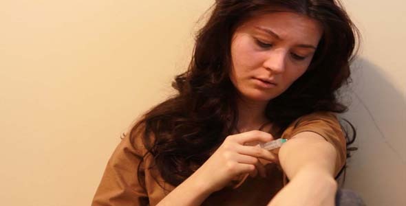 Woman Giving An Injection Woman Giving An Injection